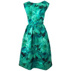 Beautiful 1950s demi couture green botanical floral print silk fit n' flare sleeveless dress ! Features various shade of green throughout. Hidden metal zipper up the back with hook-and-eye closure. Can easily be worn for any day or evening event. Perfect with wedges, sandals or flats for day, and heels for evening. Very well made with couture quality of hand finished details. In great condition Approximately Size Medium Measurements: 38 inch bust 30 inch waist Up to 50 inch hips 40.5 inches from Vintage 50s Dress, Chiffon Cocktail Dress, Velvet Cocktail Dress, Vintage Dresses 50s, Satin Cocktail Dress, Silk Chiffon Dress, Flutter Dress, Beaded Chiffon, Lace Shift Dress