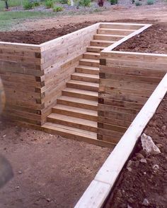 the steps are made out of wood and ready to be built into the garden area