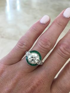 Liz Legg Jewelry: Art Deco style diamond ring with calibre emerald halo Diamond And Emerald Ring, Art Deco Rings, Jewerly Art, Deco Rings, Art Deco Emerald, Bijoux Art Nouveau, Black Tungsten Rings, Sterling Silver Jewelry Handmade, Wolfram