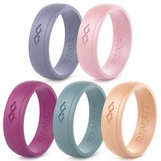 four different colored rings with the word love on them