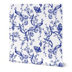 a blue and white wallpaper with birds on it