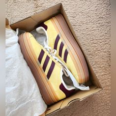 The Trendy Adidas Gazelle Bolds In Yellow/Maroon Colorway! Perfect Pop Of Color Yet Still Neutral! So Cute. Sold Out Everywhere! Size Womens 8.5! Brand New With Original Box. Never Worn. Just Changed Mind And Never Wore The Sneakers (And Past The Return Window) So Listing It On Here For Discounted Price! You Are Lucky If You Get This Item!! Literally Brand New Adidas Gazelle Bolds For Sale Price! Make It Yours Yellow Adidas Shoes, Yellow Adidas Sporty Sneakers, Sporty Yellow Adidas Sneakers, Adidas Gazelle Mustard Yellow, Adidas Yellow Leather Sneakers, Adidas Bold, Adidas Gazelle Bold, Gazelle Bold, Maroon Color