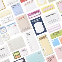 many different types of sticky notes on a white surface