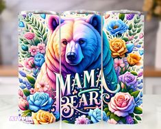 two beer cans with the words mama bear painted on them