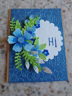 a close up of a card with flowers on it