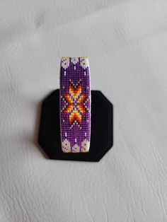 "I use size 15 seed beads. The length is 6\" and width is 3/4\". Product is an adjustable cuff bracelet with pig skin covering." Handmade Adjustable Purple Cuff Bracelet, Adjustable Purple Beaded Wristband, Native Beadwork, Native American Beading, Pig Skin, Beautiful Bracelet, Beaded Bracelet, Cuff Bracelet, Seed Beads