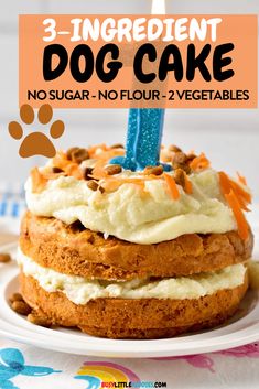 a dog cake with white frosting and blue candles on top is shown in front of the words 3 - ingredient dog cake