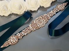 "Dark Teal Bridal Belt, Peacock Wedding Belt, Bridal Sash, Wedding Dress Belt, Belt for Bride, Crystal Rhinestone Belt, Bridesmaid This is a beautiful bridal belt that will complement your dress in the most elegant way! Made with double faced satin or organza ribbon of great textile quality. Pleasant to eye and soft to touch. The color is wholesome and saturated. The jewel includes rhinestones of different sizes and shapes. Together, the satin and the jewel create a great looking belt which is p Sash Wedding Dress, Dress Ribbon, Wedding Belt, Wedding Dress Belt, Jewel Colors, Belt Length, Rhinestone Belt, Bridal Sash