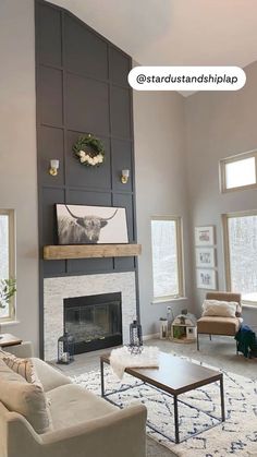 a living room filled with furniture and a fire place in the middle of a room