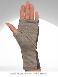 a hand with a wrist brace attached to it's thumb and the fingers are open