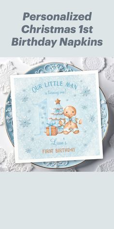 personalized christmas 1st birthday napkins with a teddy bear on the plate and snowflakes