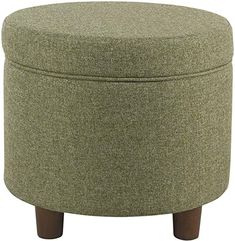 a round ottoman with wooden legs and a light green fabric upholstered cover on the top