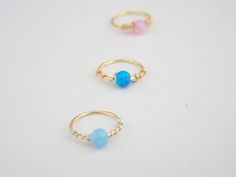 This listing is for ONE or more tiny dainty 14k gold filled hoop with tiny 3mm loose Fire Opal bead. If you buy more than one you get a discount (please take a look at the style options Please choose your style. size: gauge: 22g. inner diameter:8mm. FOR different size please contact me. ★To open the ring gently twist the ends sideways, slip into the hole and then gently twist the ends back for a continuous hoop. ★PLEASE NOTE: All pieces are created by hand, so there can be slightly difference be Dainty Gold Hypoallergenic Toe Rings, Gold Dainty Hypoallergenic Toe Rings, Gold Hypoallergenic Dainty Toe Rings, Dainty Small Hoop Hypoallergenic Rings, Dainty Small Hoop Stackable Cartilage Earrings, Dainty Stackable Small Hoop Cartilage Earrings, Dainty Gold Nickel-free Toe Rings, Dainty Gold Toe Rings Nickel-free, 14k Gold Stackable Cartilage Earrings As Gift