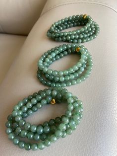 🌈 Jadeite Beaded (6.8mm) Necklace Bracelet, Green, 108 beads 🌷 Untreated Natural Jadeite/ Grade A Jade 🌷 Jade from Myanmar/ Burma 🌷 100% handmade carving 🌷 Bead size : 6.8mm 🌷 Number of Beads : ~108 🌷 Color : Green 🌷 Free shipping from Hong Kong with tracking number provided 🌷 Take approximately 7-28 days to arrive worldwide ❤️ In Chinese Culture: Young people wear jade pendant will have a prosperous life, attracts good luck and friendship Old people wear jade pendant will have a health Cheap Beaded Jade Jewelry, Real Jade Bracelet, Luxury Hand-strung Green Beads, Green Jade Jewelry, Cheap Polished Bead Jade Necklaces, Cheap Jade Beaded Necklaces, Cheap Traditional Green Beaded Bracelets, Luxury Blue Jade Jewelry, Jade Pearl Necklace