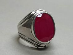 Ruby 925 Sterling Silver Handmade Ring 𝐏𝐫𝐨𝐝𝐮𝐜𝐭 𝐓𝐲𝐩𝐞: Ring 𝐑𝐢𝐧𝐠 𝐒𝐢𝐳𝐞𝐬: 5 US, 6 US, 7 US, 8 US, 9 US, 10 US, 11 US, 12 US, 13 US, 14 US, 15 US, 16 US 𝐌𝐞𝐭𝐚𝐥 𝐓𝐲𝐩𝐞: 925 Sterling Silver 𝐆𝐞𝐦𝐬𝐭𝐨𝐧�𝐞: Ruby, Yaqoot 𝐆𝐞𝐦𝐭𝐨𝐧𝐞 𝐂𝐨𝐥𝐨𝐫: Red, Pink Ruby, Red Ruby, Lal Yaqoot 𝐓𝐲𝐩𝐞: Lab-Created (High-Quality) Rubies, the birthstone of July, are considered the king of gems and represent love, health, and wisdom. It was believed wearing a fine red Ruby bestowed good f Red Gem Stone Rings For Men, July Birthstone Ring, Pink Ruby, Birthday Ring, Men Ring, Ring Oval, Birthday Gift For Him, July Birthstone, Ring Sizes