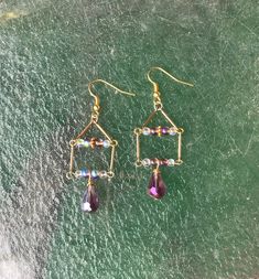 Purple crystal teardrops, iridescent beads, and gold connector bars. Purple Drop Earrings, Gold Sunburst, Earring Kit, Diy Earring, Ocean Jewelry, Earring Ideas, Crystal Dangle Earrings, Diy Rings, Purple Crystal