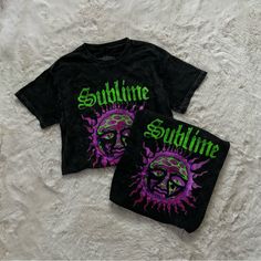 Sublime T-Shirt Unisex Size Small (Fit True To Size) New Without Tags. Dead Stock Tee, Straight From Retailer. Never Worn. Perfect Condition. Regular Fit, Full Length, Crewneck With Short Sleeves. Washed Black/Gray Vintage Style With Green And Pink Graphic Print On Front. 100% Cotton. If You Have Any Questions Feel Free To Ask:) If You Don’t Like The Price Please Send An Offer:) * All Bundle Orders Are Discounted * All Orders Are Packaged With Care And Have Same Day Or Next Day Shipping Urban Outfitters Summer Top With Text Print, Urban Outfitters Text Print Top For Summer, Urban Outfitters Text Print Tops For Streetwear, Trendy Urban Outfitters T-shirt For Streetwear, Black Relaxed Fit T-shirt By Urban Outfitters, Urban Outfitters Black Relaxed Fit T-shirt, Urban Outfitters Grunge T-shirt For Streetwear, Green Band Merch Tops For Summer, Black Graphic Tee By Urban Outfitters