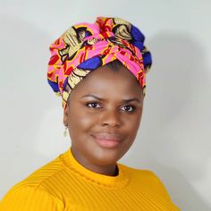 Our gorgeous Yasmin Bonnet wrap is made of Authentic 100% Kente African Print fabric, lined with hair protective Satin fabric featuring 88' inch long attached belt/strap to wrap around your head in many different styles. the straps also maximizes comfort and allows you to wear your bonnet at ease.Our bonnets are designed to protect your hair from dryness and breakage and can be worn both at home or out running errands, can also be worn as a Surgical Cap for Doctors and Nurses, can be a great gif Bohemian Adjustable Wrap Headwrap, Adjustable Bohemian Wrap Headwrap, Adjustable Pink Turban For The Beach, Adjustable Pink Turban For Beach, Adjustable Multicolor Headband Headscarf, Adjustable Multicolor Turban With Matching Headband, Adjustable Multicolor Turban Headband, Adjustable Bohemian Bonnet Headband, Bohemian Wrap Headscarf