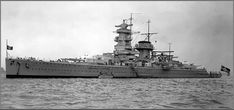 an old photo of a battleship in the water