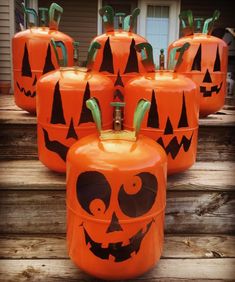 halloween pumpkins with faces painted on them