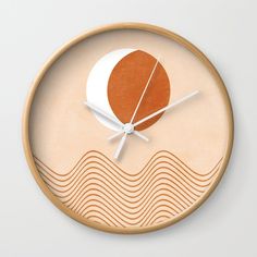 an orange and white clock with waves on it