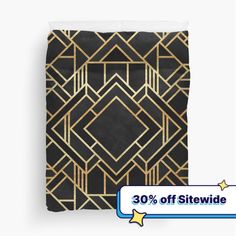 a black and gold bed cover with an art deco design on the front, 30 % off