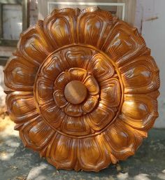 a large brown flower shaped object sitting on top of a table