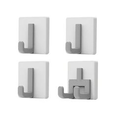 four pieces of white plastic with metal handles