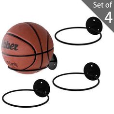 three basketballs with black rings around them on a white background, set of 4