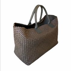 * Free Shipping * Green, Leather With Intrecciato Weaving, Dual Shoulder Straps, Unlined, Open Closure, Model #113129 Bottom Width: 17.7”, Top Width: 24.8”, Depth: 9”, Height: 12.2”, Handle Drop: 6” Includes Dust Bag. Excellent Condition Classic Woven Leather Bags For Shopping, Classic Woven Leather Shopping Bags, Rectangular Shoulder Bag With Leather Handles For Everyday Luxury, Rectangular Intrecciato Weave Shoulder Bag For Shopping, Rectangular Intrecciato Shoulder Bag For Shopping, Luxury Brown Bags With Intrecciato Weave, Luxury Brown Bag With Intrecciato Weave, Designer Woven Leather Travel Bag, Designer Travel Bag With Woven Leather