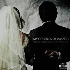 a man and woman standing next to each other in front of a wall with the words my chemical romance on it