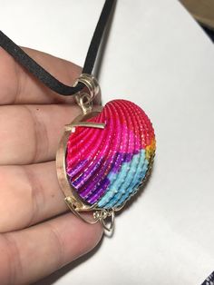 Rainbow Shell Pendant. This is a silver plated natural seashell that has been dyed. Hematite Ring, Quartz Crystal Pendant, Shell Pendant, Quartz Necklace, Crystal Cluster, Amethyst Crystal, Staple Pieces, Crystal Pendant, Quartz Crystal