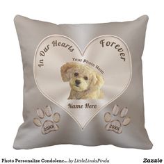 a white pillow with a dog's paw prints on it and the words in your heart