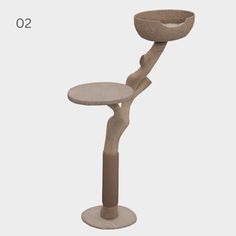 a chair with a wooden arm and foot rest in the shape of a bird feeder