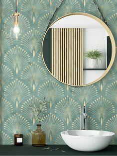 a bathroom sink with a mirror above it next to a green wallpapered wall