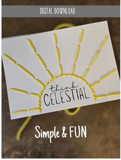 a white card with yellow string on it and the words, simple & fun written in black