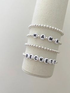 one name bracelet made with 4mm sterling silver beads bracelets are made on a durable stretch elastic cord please refer to our sizing guide before purchasing Rainbow Writing, Gold Writing, Sterling Silver Bead Bracelet, Silver Bead Bracelet, Beads Bracelets, White Rainbow, Name Bracelet, Sterling Silver Bead, Silver Beads