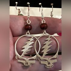 Grateful Dead Steal Your Face Hanging Earrings, Artisan Handmade With Love. Wood Brown Bead & Silver. One Of A Kind! Steal Your Face, Hanging Earrings, Brown Silver, Grateful Dead, Handmade Artisan, Wood Beads, Handmade With Love, With Love, Jewelry Earrings