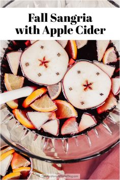 punch bowl filled with red sangria with apple slices floating on top. Easy Fall Sangria, Apple Sangria Recipes, Cinnamon Schnapps, Fall Apple Cider, Fall Drink Recipes, Apple Whiskey, Apple Sangria, Cider Sangria, Apple Cider Sangria