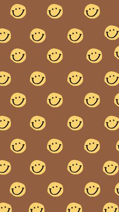 a brown background with yellow smiley faces