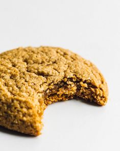 a close up of a cookie on a white surface