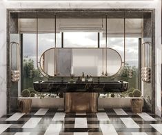 a bathroom with black and white checkered flooring, large mirror above the bathtub