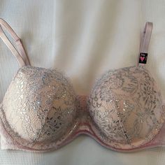 Nwt New With Tags Victoria’s Secret Very Sexy Push-Up Bra With Shine, Lace, And Velvet Details. Size 34b. Has Size Tag On Shoulder Strap, But Does Not Have Price Tag As It Was From Online Order. Brand New, Never Worn. Knockout! Victoria's Secret Party Bra With Removable Pads, Silver Fitted Bra For Party, Victoria's Secret Gray Bra, Fitted Gray Push-up Bra, Gray Fitted Push-up Bra, Fitted Silver Bra, Elegant Fitted Gray Bra, Party Stretch Bra With Lined Body, Seamless Fitted Bra For Party