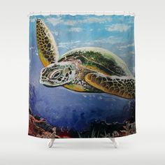 a shower curtain with a painting of a turtle swimming in the ocean on it's side