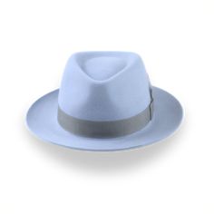 Description Materials Craftsmanship Hat Care Shipping Returns Product Description A Medium Crown Design for a Sleek Look Upgrade your style game with the Clubber, a light blue fur felt fedora that makes a bold statement. Crafted from luxurious fur felt, this hat features a medium crown and is adorned with a sleek grey grosgrain ribbon band, complete with a stylish feather. Whether you're dressing up for a night out or adding a touch of sophistication to your everyday look, the Clubber is versati Mens Felt Hats, Spanish Hat, Homburg Hat, 1940 Style, Gambler Hat, Mens Hats Fashion, Fedora Hat Men, Why Do Men, Homburg