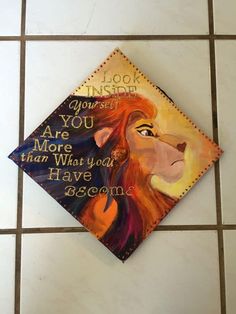 a lion themed graduation cap with the words you are more than what you have been