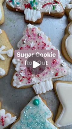 sugar cookie decorated with icing and sprinkles in the shape of christmas trees