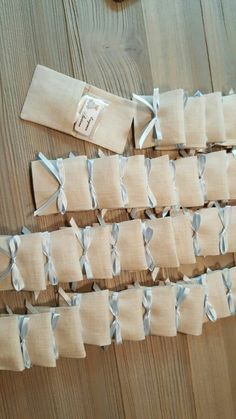 several pieces of cloth tied together on top of a wooden table