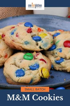 small batch m & m cookies on a blue plate with the title overlay that reads, small batch m and m cookies