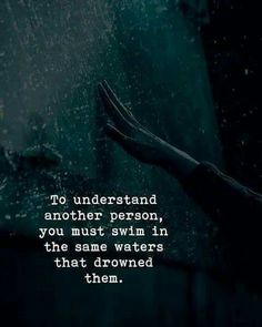 someone is holding their hand out in the rain, saying to understand another person you must swim in the same waters that drowns them